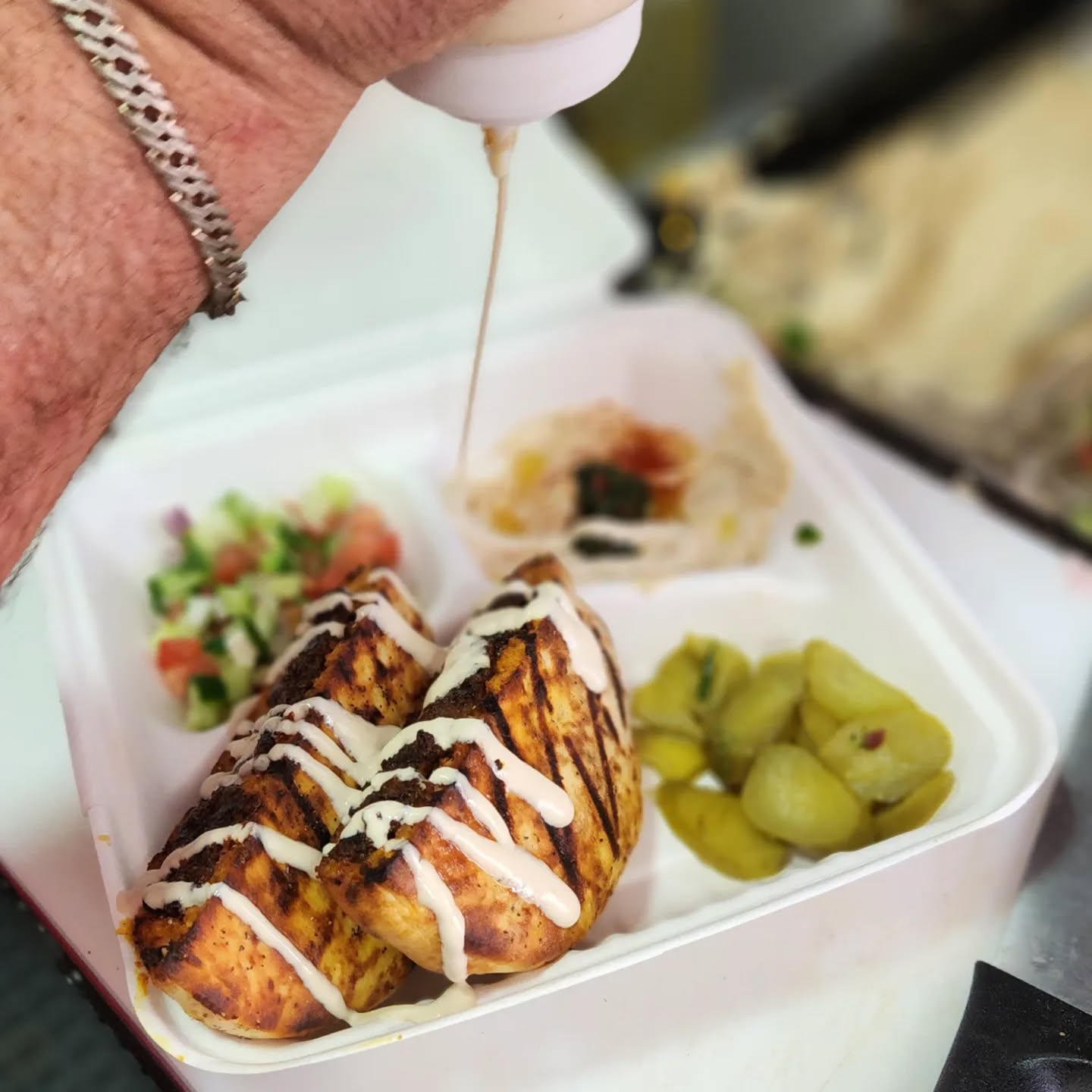 Authentic falafel and shawarma preparation at Yalla Durham